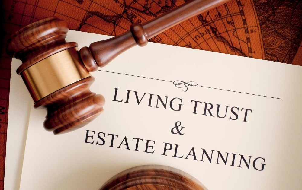 Living Trust and Estate Planning document beside a gavel.